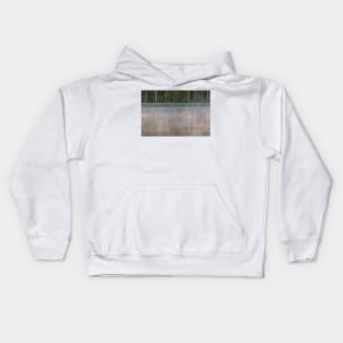 Forest reflecting to small lake at morning Kids Hoodie